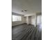 Simple bedroom with wood-look floors and closets at 521 S Maryland Pkwy # A10, Las Vegas, NV 89101