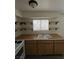 Simple kitchen, offering ample counter space and wooden cabinets at 521 S Maryland Pkwy # A10, Las Vegas, NV 89101
