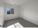 Bright bedroom with closet and carpet flooring at 5960 Palmilla St # 3, North Las Vegas, NV 89031