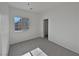 Well-lit bedroom featuring a closet and carpet flooring at 5960 Palmilla St # 3, North Las Vegas, NV 89031