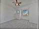 Large bedroom with a ceiling fan and window seat at 5960 Palmilla St # 3, North Las Vegas, NV 89031
