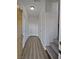 Bright entryway with vinyl flooring, leading to stairs and additional rooms at 5960 Palmilla St # 3, North Las Vegas, NV 89031