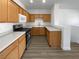 Kitchen with light wood cabinets and stainless steel appliances at 5960 Palmilla St # 3, North Las Vegas, NV 89031