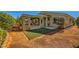 Backyard with covered patio and landscaping at 7260 Fruitful Harvest Ave, Las Vegas, NV 89131