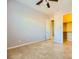 Spacious bedroom with walk-in closet and ceiling fan at 7260 Fruitful Harvest Ave, Las Vegas, NV 89131