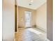 Bright entryway with tile flooring and a glass-paned door at 7260 Fruitful Harvest Ave, Las Vegas, NV 89131