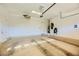 Two-car garage with overhead storage and epoxy floor at 7260 Fruitful Harvest Ave, Las Vegas, NV 89131