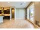Living area with tile floors and access to backyard at 7260 Fruitful Harvest Ave, Las Vegas, NV 89131