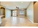 Spacious living room with tile flooring and a ceiling fan at 7260 Fruitful Harvest Ave, Las Vegas, NV 89131