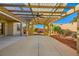 Covered patio with pergola and ceiling fan at 7260 Fruitful Harvest Ave, Las Vegas, NV 89131