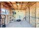Unfinished workshop with shelving and electrical at 7260 Fruitful Harvest Ave, Las Vegas, NV 89131