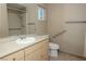 Bathroom with accessible shower and grab bars at 8032 Deep Stone Ave, Las Vegas, NV 89149