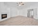 A bright living room with a modern fireplace and recessed lighting at 9247 Tulip Trestle Ave, Las Vegas, NV 89148