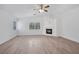 Spacious living room with a fireplace and lots of natural light at 9247 Tulip Trestle Ave, Las Vegas, NV 89148