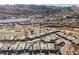 Aerial view of luxury homes near lake and golf course at 107 Reflection Cove Dr, Henderson, NV 89011