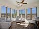 Sunroom with comfortable seating and large windows offering scenic views at 1085 Cameron Ave, Logandale, NV 89021