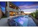 Luxury backyard oasis featuring a sparkling pool and spa at 12445 Iron Bluff Ave, Las Vegas, NV 89138