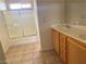 Clean bathroom with double vanity and shower/tub combo at 1434 Summer Glow Ave, Henderson, NV 89012