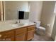 Bathroom with wood vanity and tiled floor at 1434 Summer Glow Ave, Henderson, NV 89012
