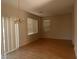 Spacious dining area with hardwood floors and chandelier at 1434 Summer Glow Ave, Henderson, NV 89012