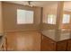 Bright dining room with hardwood floors and access to the patio at 1434 Summer Glow Ave, Henderson, NV 89012