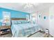 Bright bedroom with a king-size bed and en-suite bathroom access at 2225 Chandler Ranch Pl, Laughlin, NV 89029