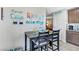 Small dining area with table and chairs, adjacent to kitchen at 2225 Chandler Ranch Pl, Laughlin, NV 89029