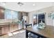 Kitchen with stainless steel appliances and light teal accents at 2225 Chandler Ranch Pl, Laughlin, NV 89029