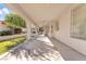 Spacious backyard with covered patio and lush lawn at 31 Castle Creek Ct, Las Vegas, NV 89148