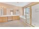 Bathroom with double vanity and large shower at 31 Castle Creek Ct, Las Vegas, NV 89148