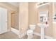 Clean bathroom with pedestal sink and shower/tub combo at 31 Castle Creek Ct, Las Vegas, NV 89148