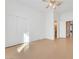 Bright bedroom with double doors and light flooring at 31 Castle Creek Ct, Las Vegas, NV 89148