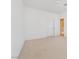 Spacious bedroom with neutral walls and carpet, featuring double closets and ceiling fan at 31 Castle Creek Ct, Las Vegas, NV 89148