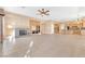 Large Gathering room with tile floors, a fireplace, and built-in shelving at 31 Castle Creek Ct, Las Vegas, NV 89148