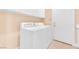 Laundry room with washer, dryer, cabinets, and utility sink at 31 Castle Creek Ct, Las Vegas, NV 89148