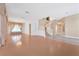 Open living space with hardwood floors and a staircase at 31 Castle Creek Ct, Las Vegas, NV 89148