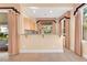 Wet bar with granite countertop and cabinets at 31 Castle Creek Ct, Las Vegas, NV 89148