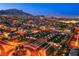 Night aerial view of community entrance and neighborhood at 351 Elder View Dr, Las Vegas, NV 89138