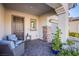 Covered entryway with seating area and door at 351 Elder View Dr, Las Vegas, NV 89138