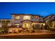 Elegant two-story home with a welcoming entrance and landscaping at 351 Elder View Dr, Las Vegas, NV 89138