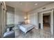 Modern bedroom with a queen-size bed and a desk at 353 E Bonneville Ave # 125, Las Vegas, NV 89101