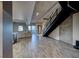 Open concept living space with modern finishes and exposed concrete wall at 353 E Bonneville Ave # 125, Las Vegas, NV 89101