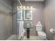 Modern bathroom with glass vanity and walk-in shower at 3829 Delaware Ln, Las Vegas, NV 89169