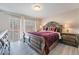 Spacious bedroom with a large sleigh bed and plenty of closet space at 3829 Delaware Ln, Las Vegas, NV 89169