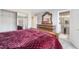 Bedroom with a large bed, dresser, and ensuite bathroom at 3829 Delaware Ln, Las Vegas, NV 89169