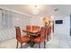 Formal dining room with large table and six chairs at 3829 Delaware Ln, Las Vegas, NV 89169