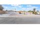 Single story home with attached two-car garage and landscaped front yard at 3829 Delaware Ln, Las Vegas, NV 89169