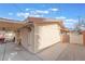 Rear exterior view showing covered patio and garage at 3829 Delaware Ln, Las Vegas, NV 89169