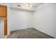 This dining area features neutral carpet and an updated light fixture at 45 Maleena Mesa St # 223, Henderson, NV 89074