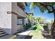 Exterior showing well-maintained landscaping along a walkway, enhancing the property's curb appeal at 45 Maleena Mesa St # 223, Henderson, NV 89074